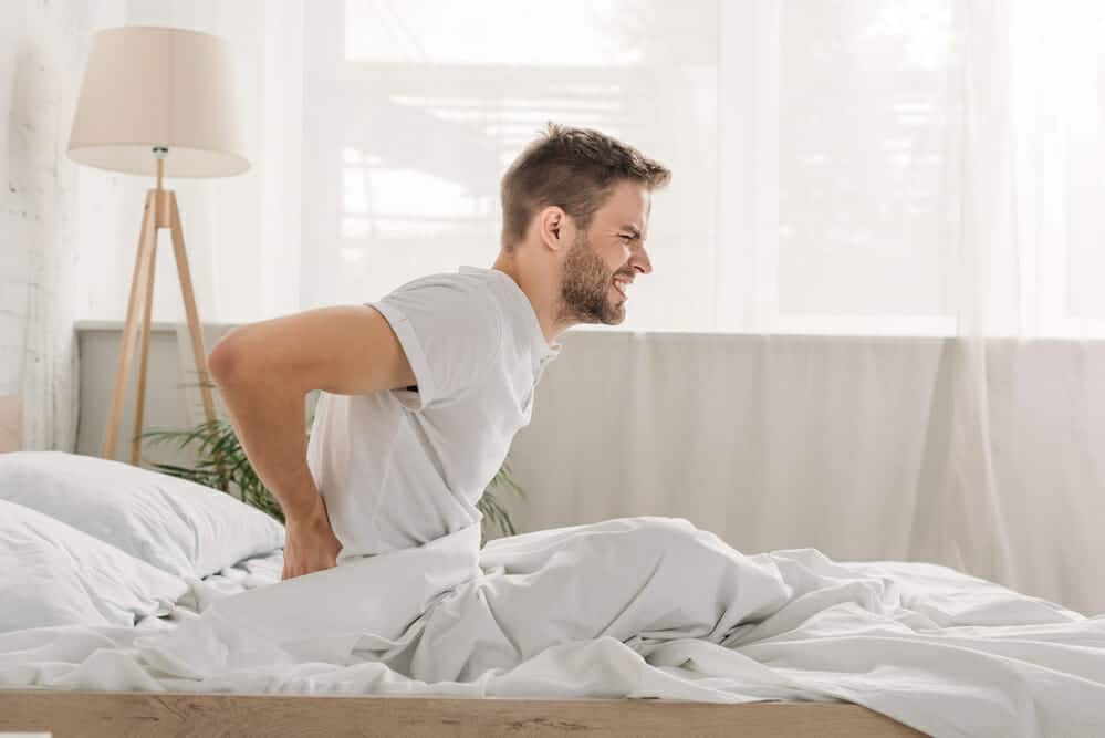 bed mattress knee pain
